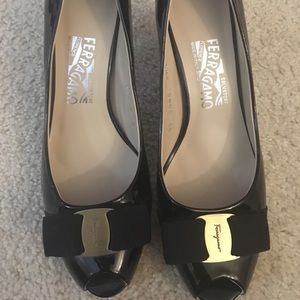 Woman’s open toe ferragamo heels